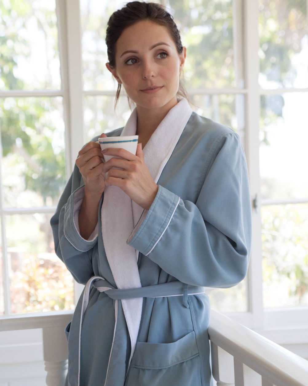 Woman wearing a spa-style robe for how to wear a bathrobe