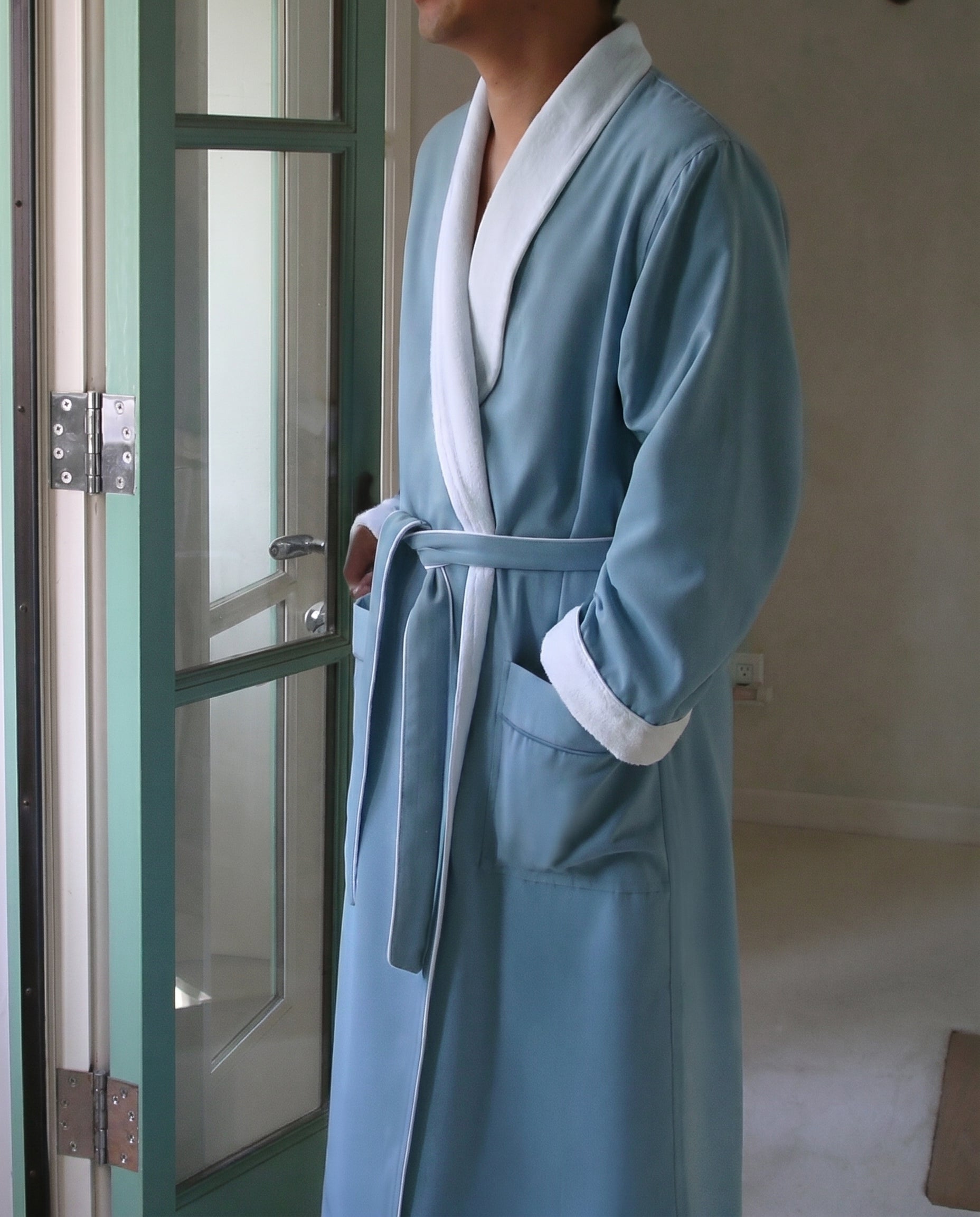 Man wearing a spa-style robe for everyday bathrobe use