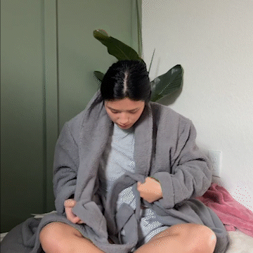 College Woman getting cozy in Plush Robe