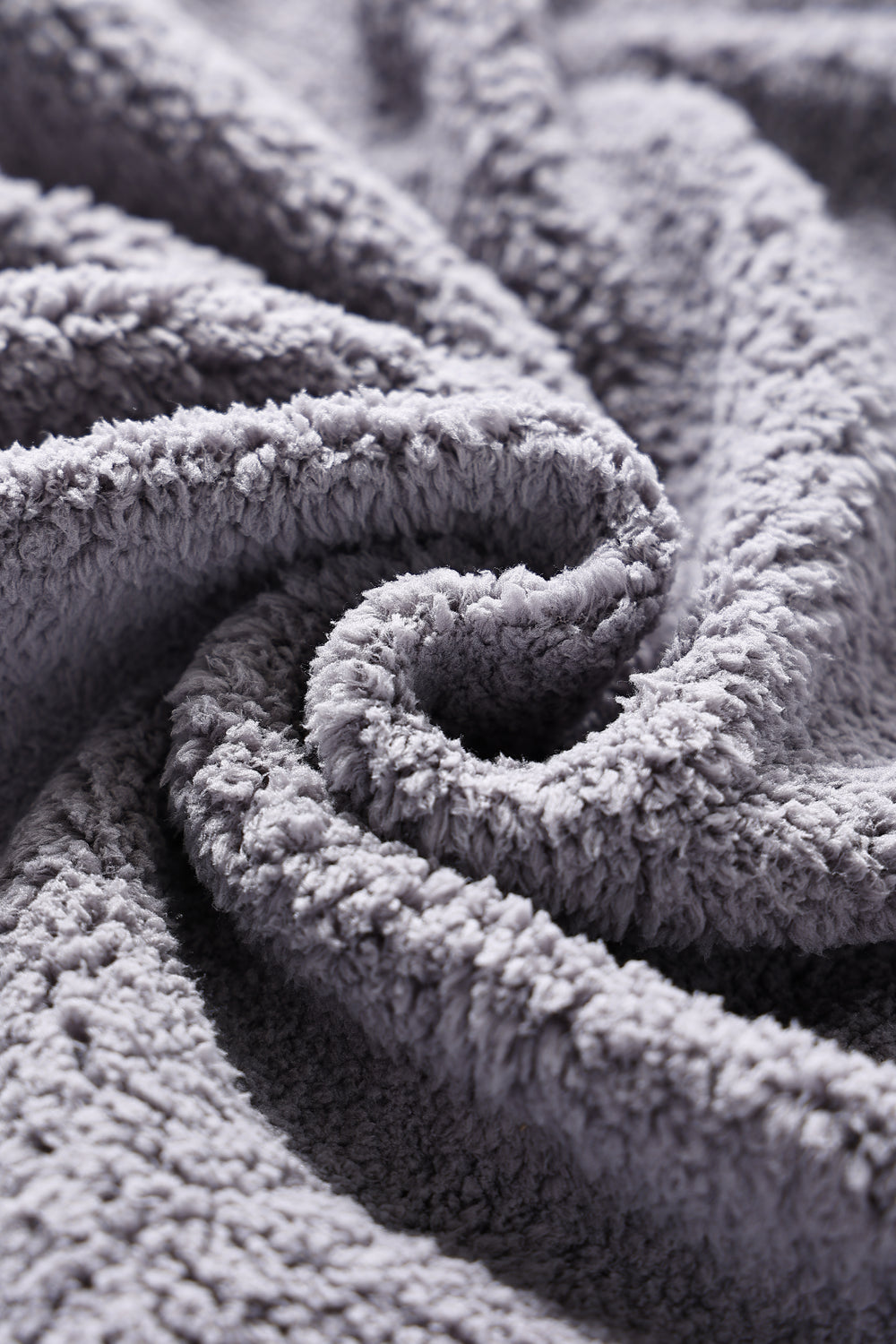 Close-up of Plush Signature Robe fabric and stitching